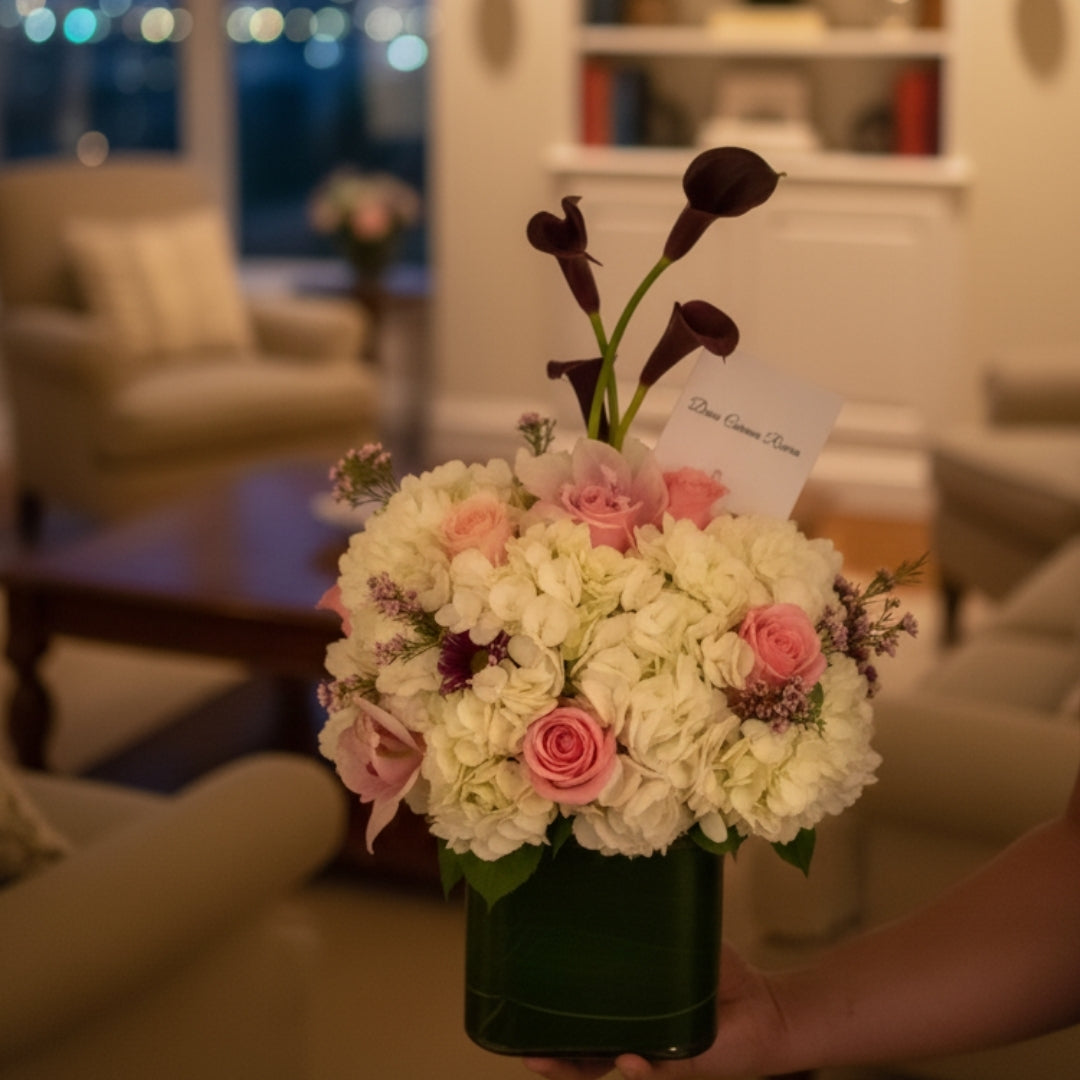 Air of Delicacy – Floral Arrangement with Roses, Orchids & Callas in Crystal Vase
