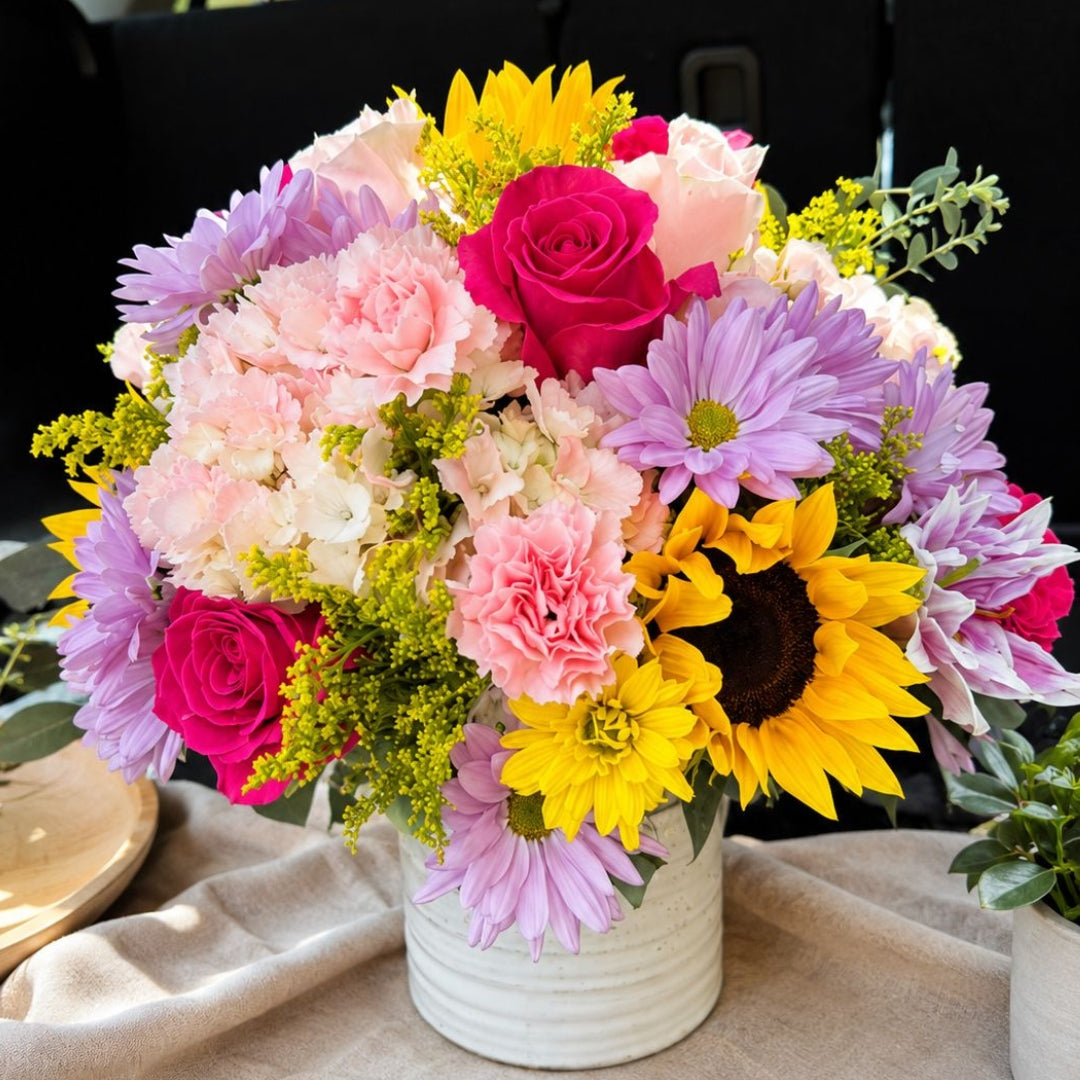 Burst of Joy – Multicolor Floral Arrangement in White Base