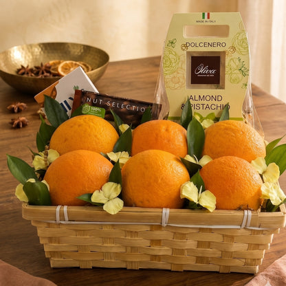 Citrus Touch – Canasta de Naranjas y Chocolates con Toque Floral