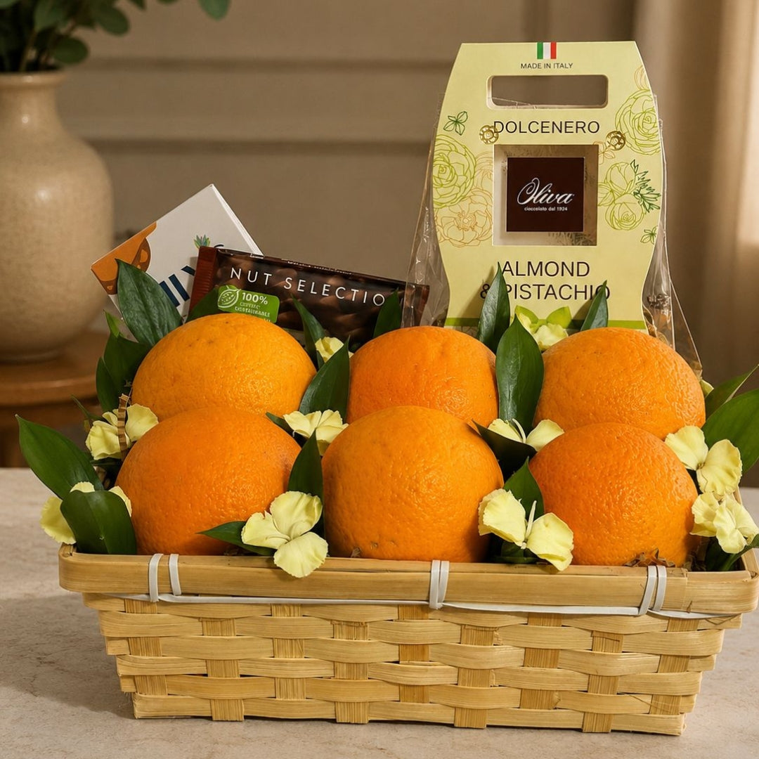 Citrus Touch – Canasta de Naranjas y Chocolates con Toque Floral