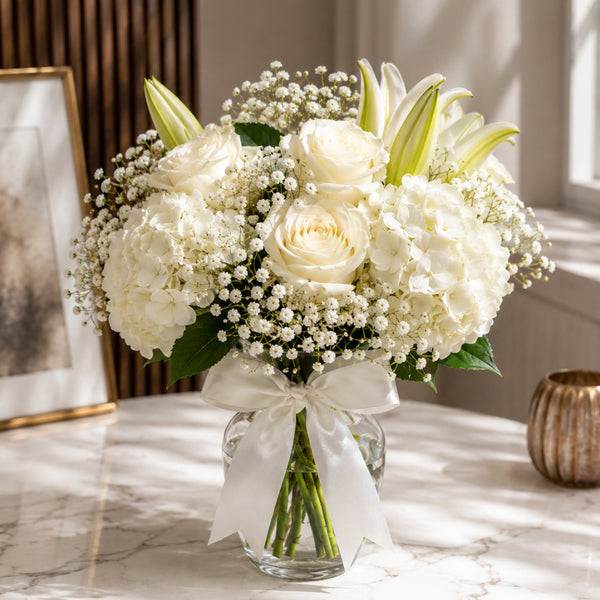 White Beside You – Elegant White Floral Arrangement in Glass Vase